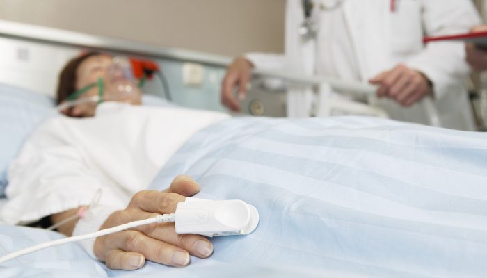 Doctor Watching Over Patient