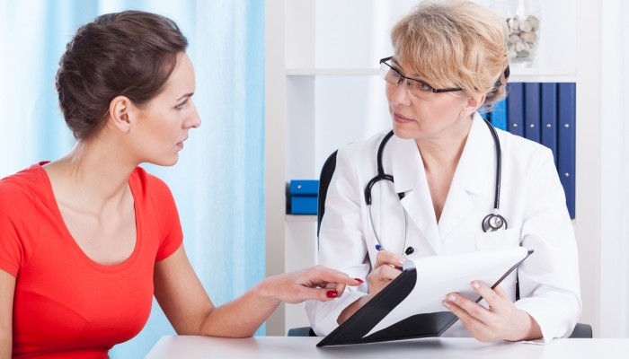 Doctor talking with patient about recommendations