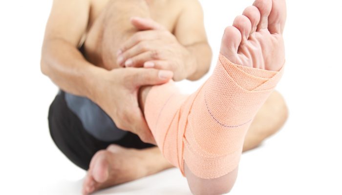 Close up of a foot with bandage.