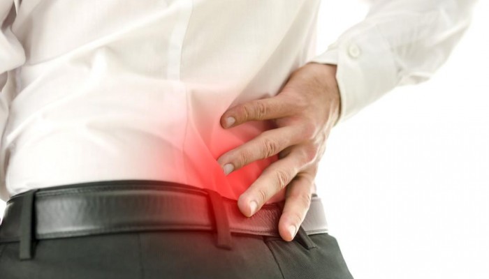 Detail of man suffering from back pain