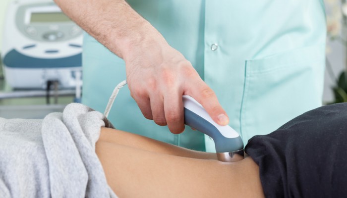 Woman During Laser Physiotherapy
