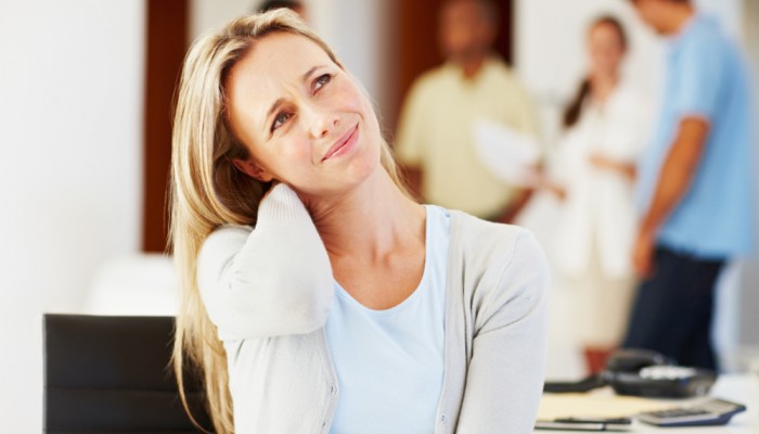 woman-rubbing-neck